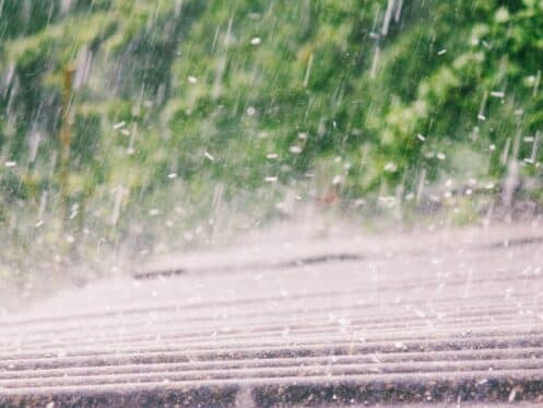 summer rain with hail on roof